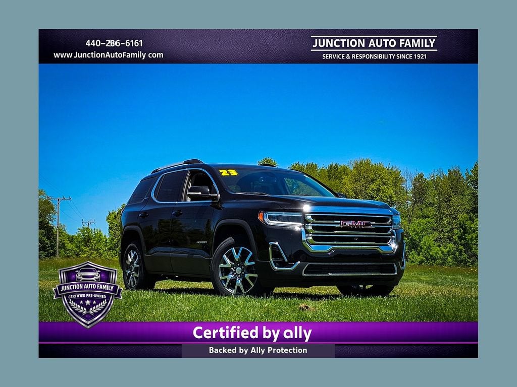 2023 GMC Acadia SLT in Ebony Twilight Metallic — front three-quarter view