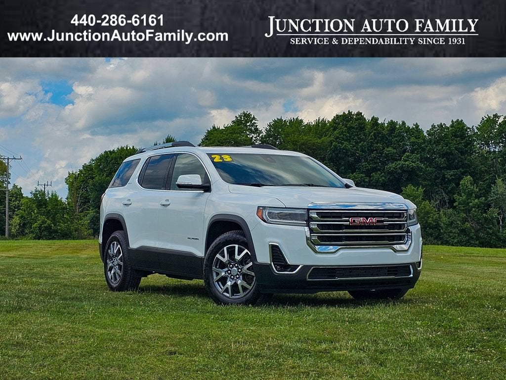 2023 GMC Acadia SLT in Summit White — front three-quarter view