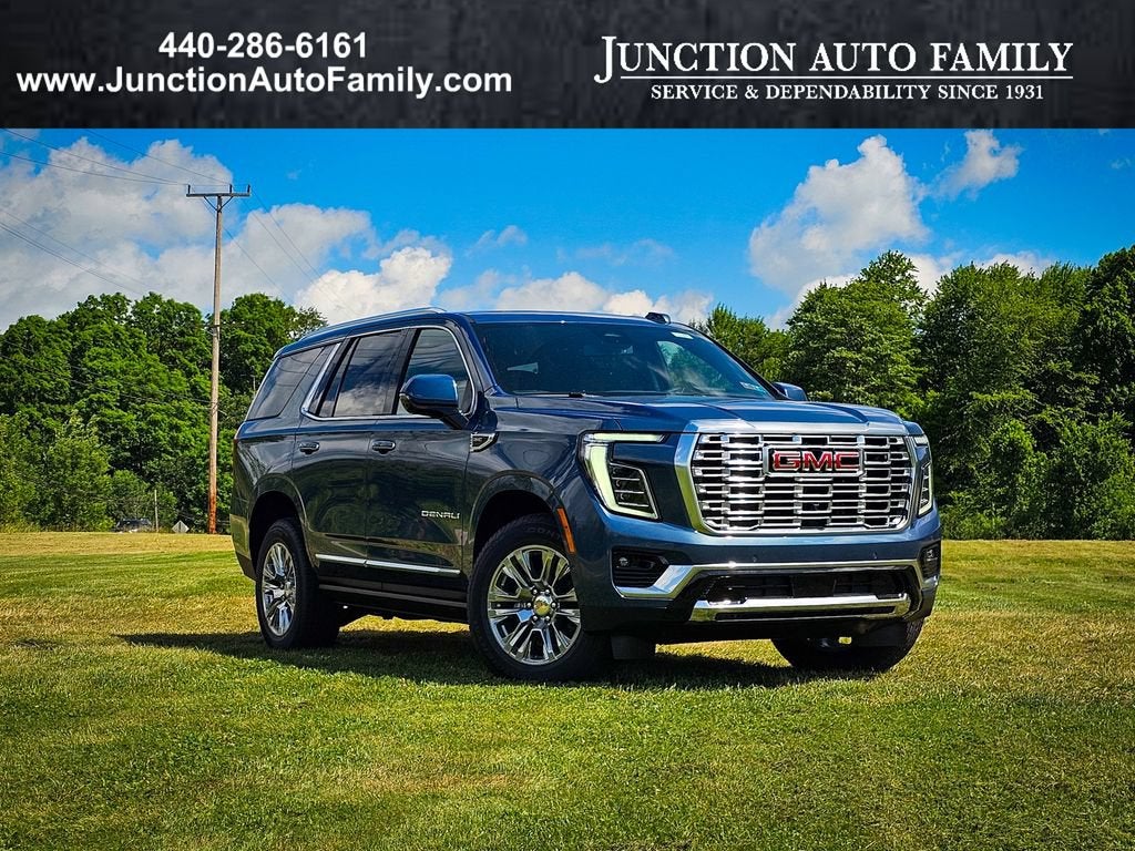 2026 GMC Yukon Denali in Downpour Metallic — front three-quarter view