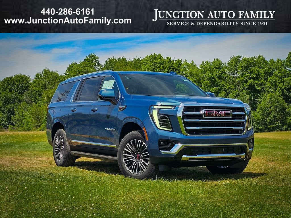 2026 GMC Yukon XL Elevation in Downpour Metallic — front three-quarter view