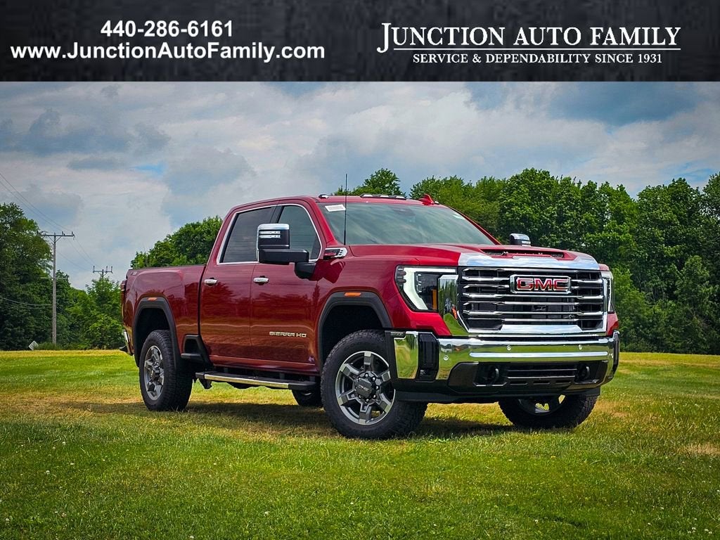 2026 GMC Sierra 2500 HD SLT in Volcanic Red Tintcoat — front three-quarter view
