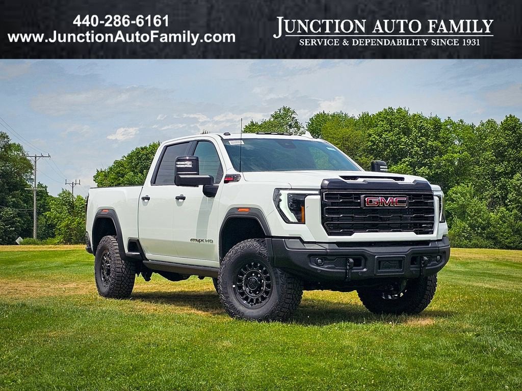2026 GMC Sierra 2500 HD AT4X in Summit White — front three-quarter view