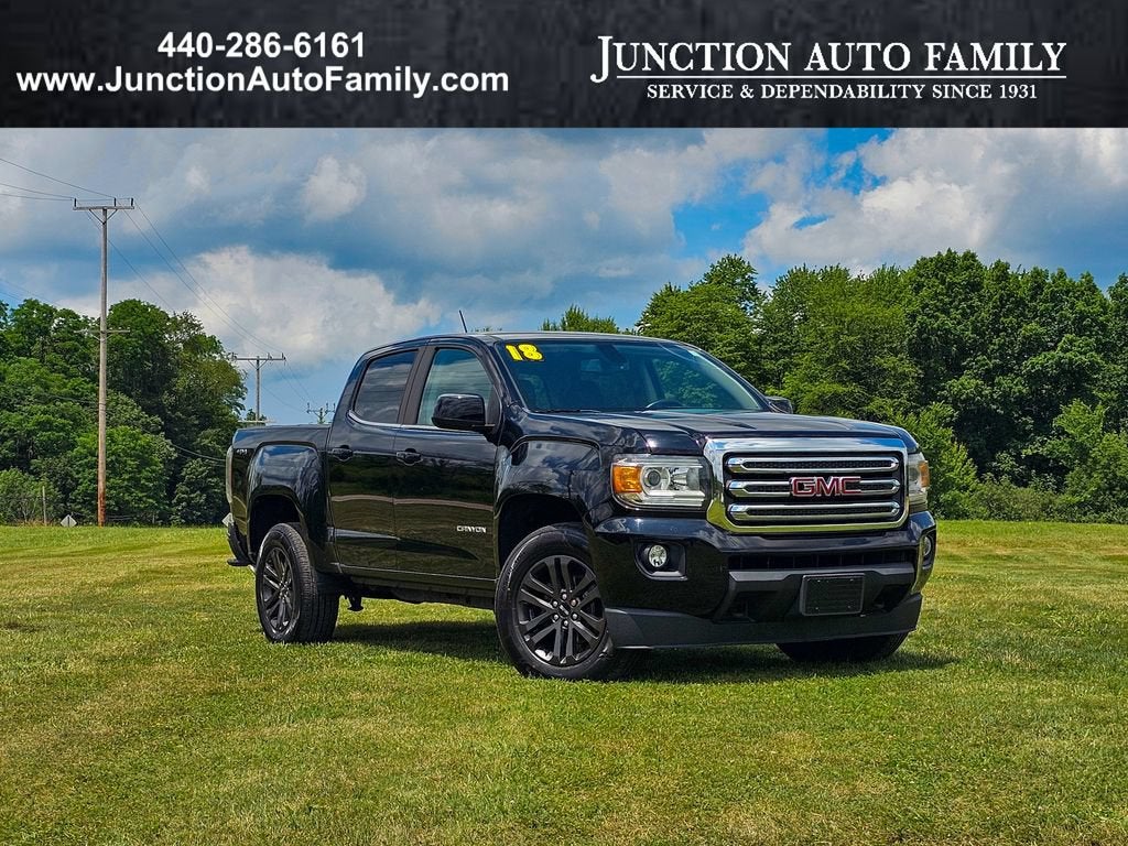 2018 GMC Canyon 4WD SLE in Onyx Black — front three-quarter view