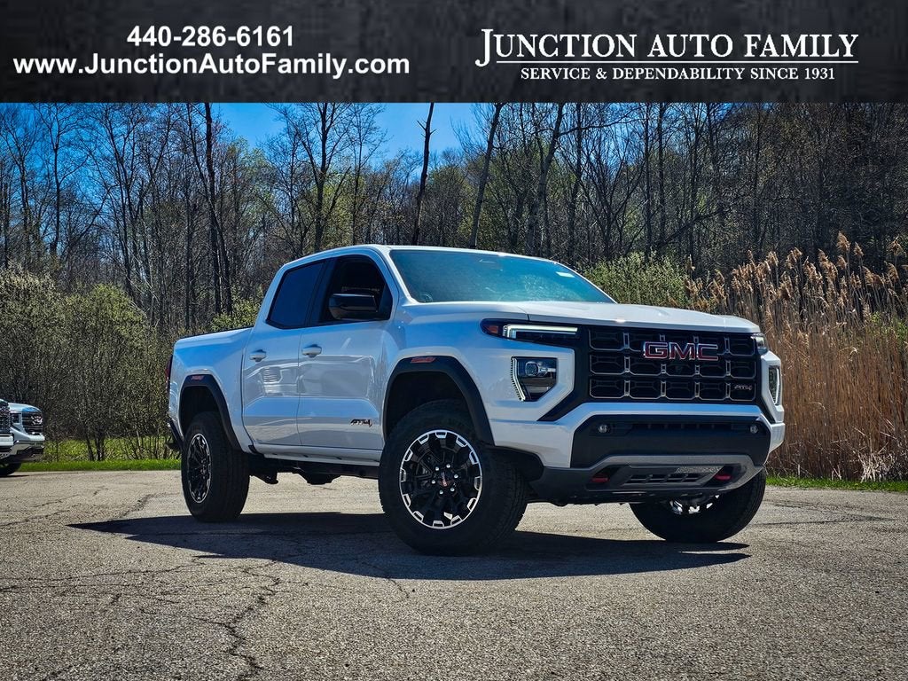 2026 GMC Canyon AT4 in Summit White — front three-quarter view