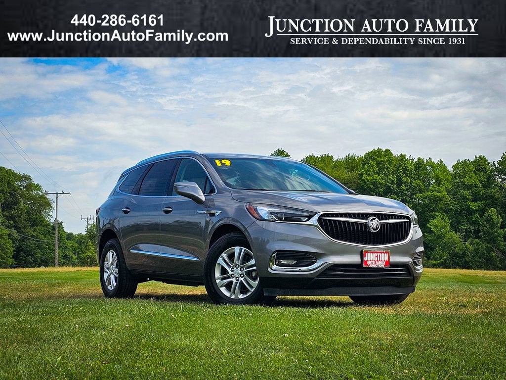 2019 Buick Enclave Essence in Includes Pitch Dark Night Lower Exterior Accent Color.) — front three-quarter view