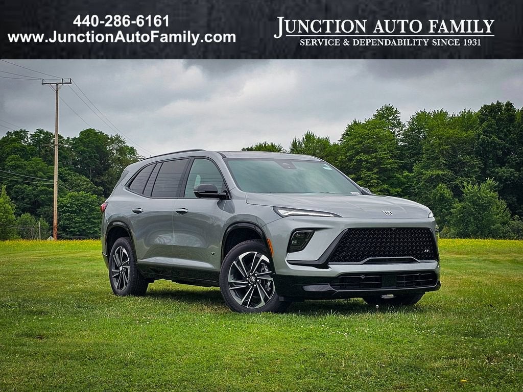 2026 Buick Enclave Sport Touring in Moonstone Gray Metallic — front three-quarter view