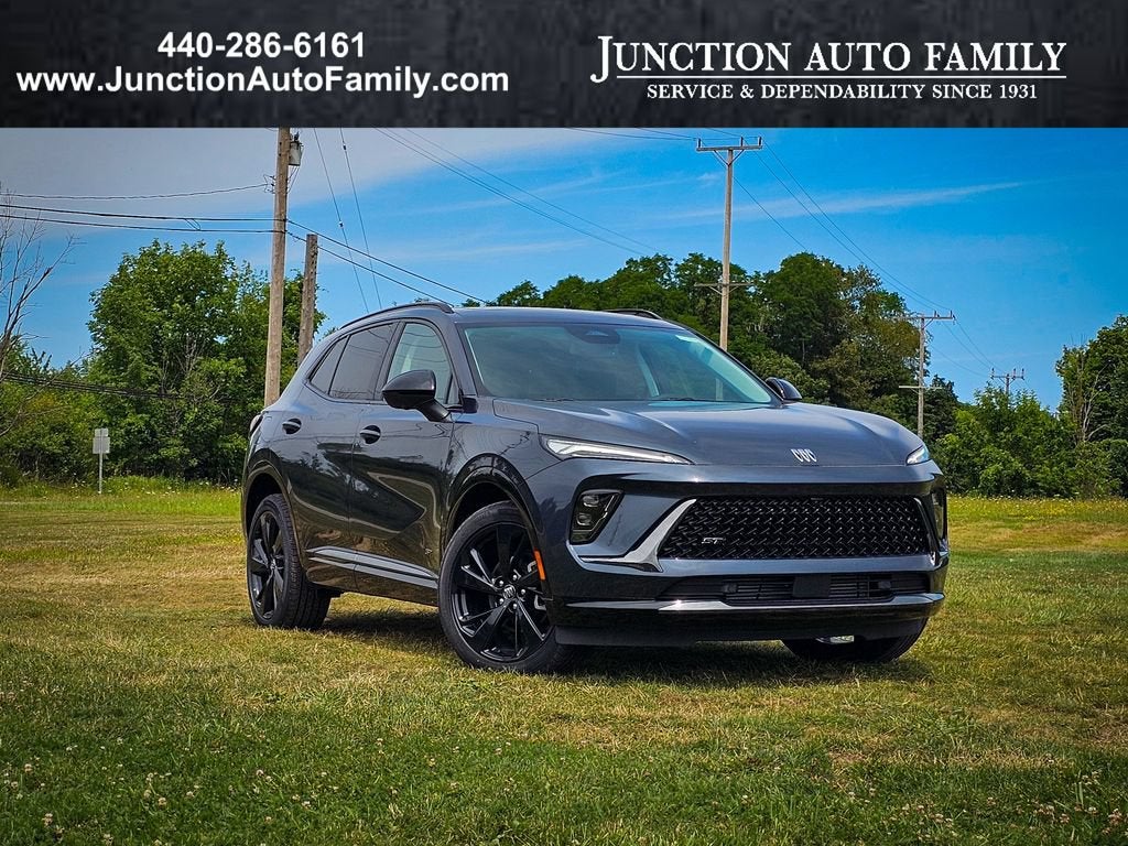 2026 Buick Envision Sport Touring in Quartz Blue Metallic — front three-quarter view
