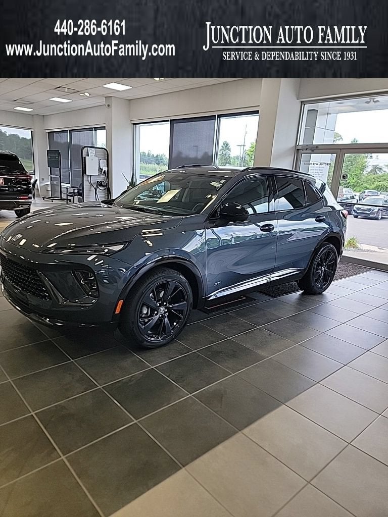2026 Buick Envision Sport Touring in Quartz Blue Metallic — front three-quarter view