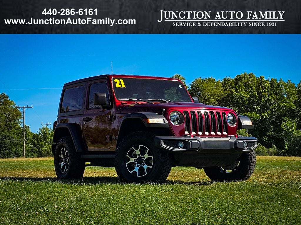 2021 Jeep Wrangler Rubicon 4x4 in Snazzberry Pearlcoat — front three-quarter view