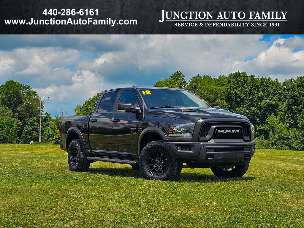 2018 RAM 1500 Rebel in Brilliant Black Crystal Pearl — front three-quarter view