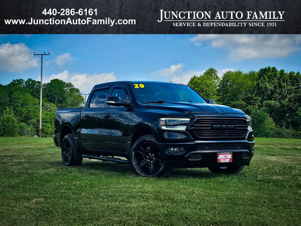 2020 RAM 1500 Big Horn Crew Cab 4x4 5'7' Box in Diamond Black Crystal Pearlcoat — front three-quarter view