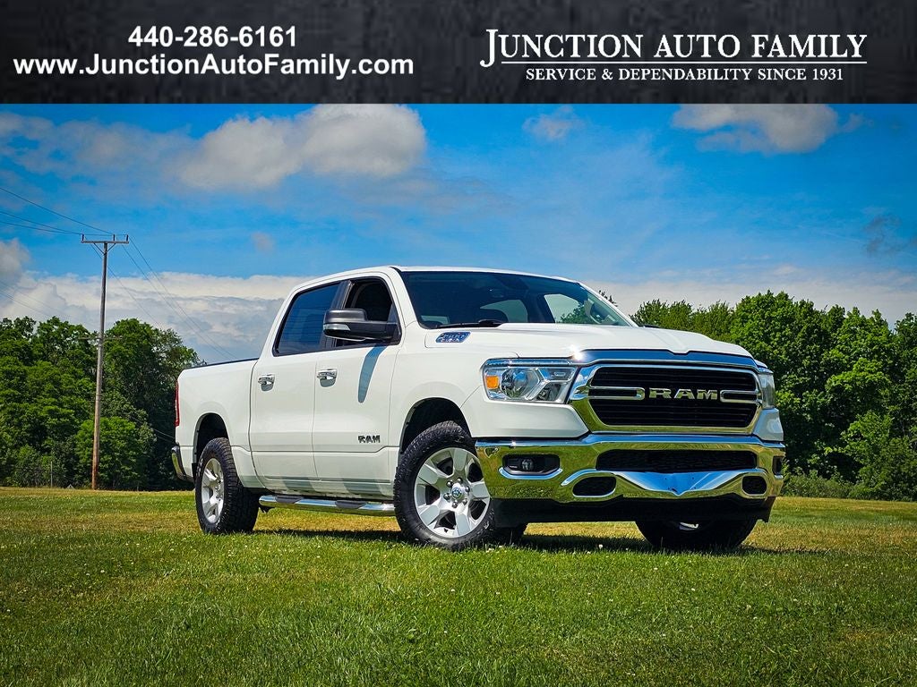 2020 RAM 1500 Big Horn Crew Cab 4x4 5'7' Box in Bright White Clearcoat — front three-quarter view