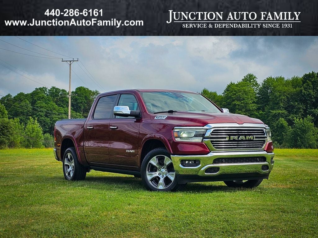 2020 RAM 1500 Laramie Crew Cab 4x4 5'7' Box in Delmonico Red Pearlcoat — front three-quarter view