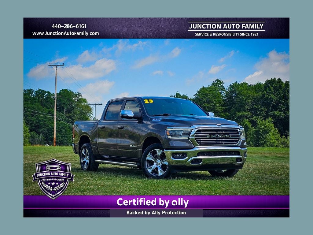 2023 RAM 1500 Laramie Crew Cab 4x4 5'7' Box in Granite Crystal Metallic Clearcoat — front three-quarter view