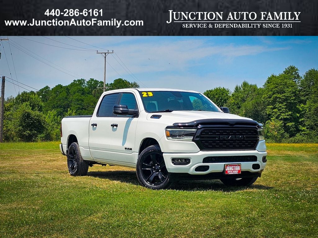 2023 RAM 1500 Big Horn Crew Cab 4x4 6'4' Box in Bright White Clearcoat — front three-quarter view
