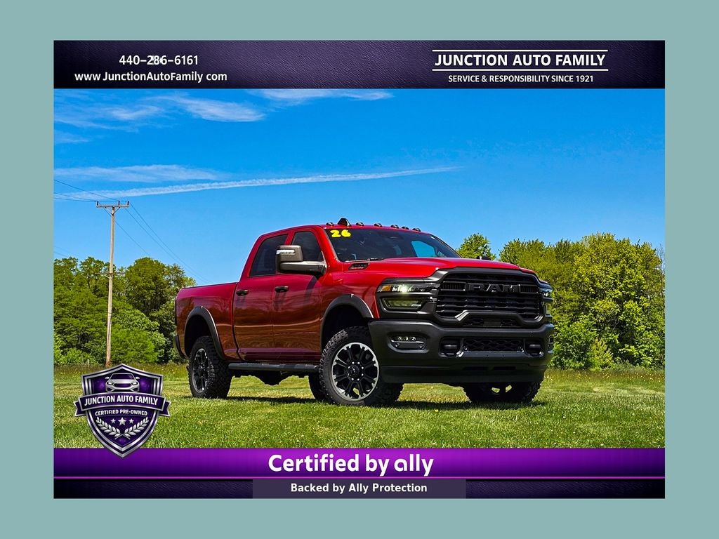 2026 RAM 2500 Warlock Crew Cab 4x4 6'4' Box in Molten Red Pearlcoat — front three-quarter view