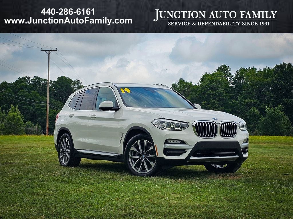 2019 BMW X3 xDrive30i in Alpine White — front three-quarter view
